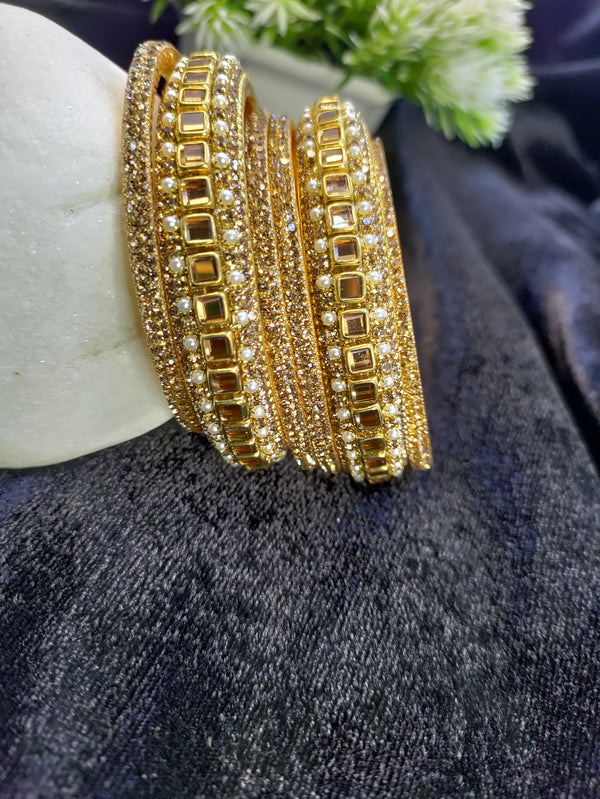 Kundan & Moti Kada
