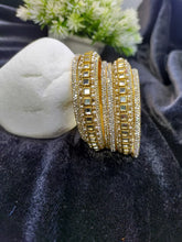 Kundan & Moti Kada