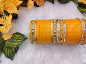 Yellow Chuda with Stone Kadas
