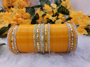 Yellow Chuda with Stone Kadas